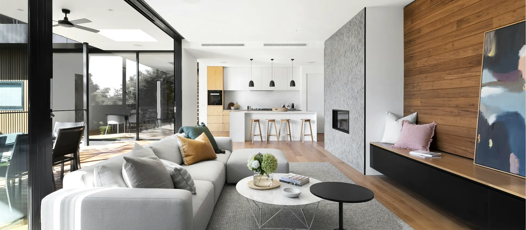 An open-plan architectural interior bathed in natural light