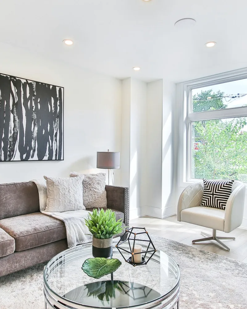 Light-filled empty living space after a move-out deep clean